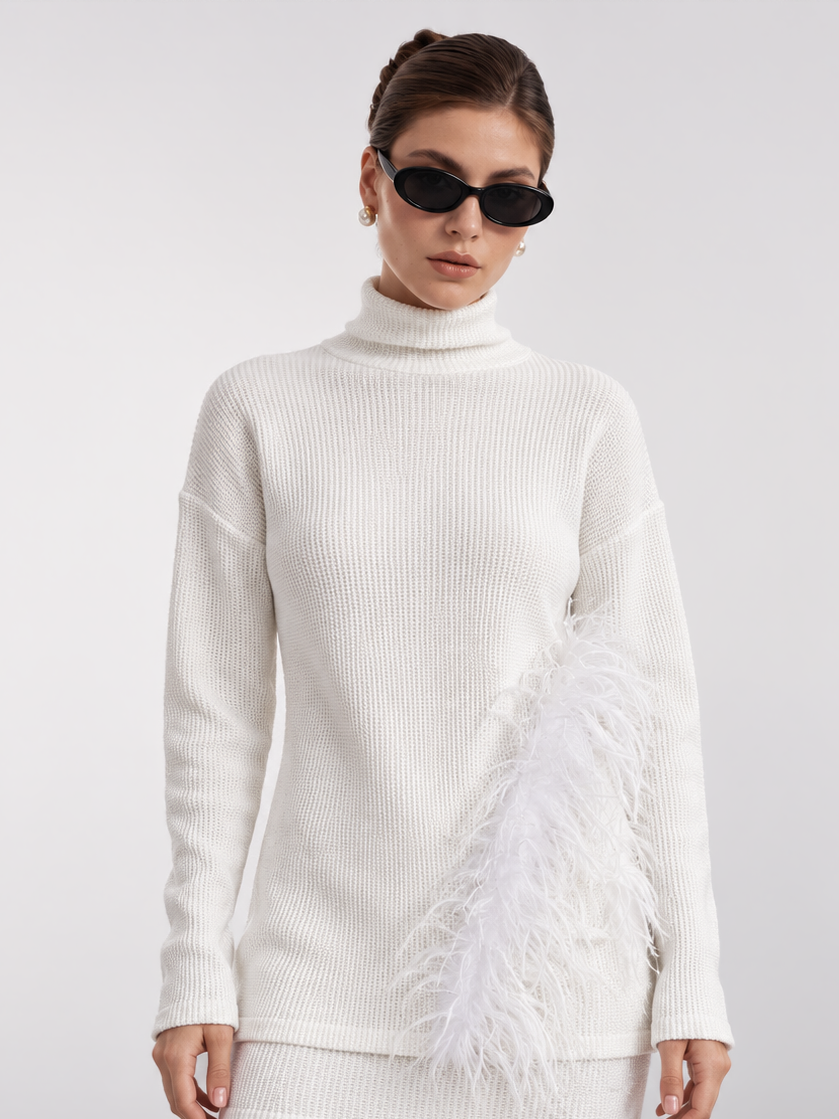 Plumelle Sweater